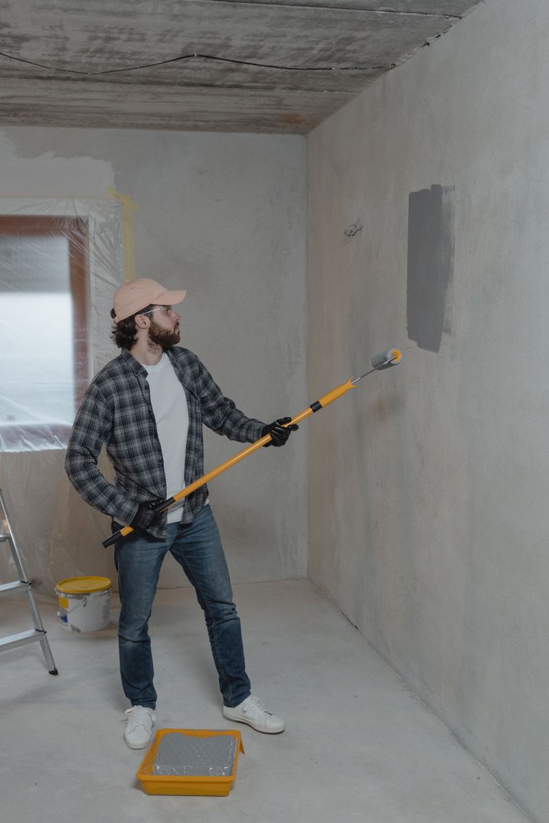 Painter assessing surfaces on site for a free painting quote Melbourne wide